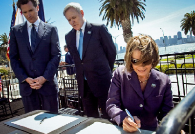 pelosi_signing_over_treasure_nancy_pelosi__navy_secretary_mabus_and_mayor_newsom_signing_the_transfer_of_treasure_island_to_san_francisco_in_august_2010_island.png 