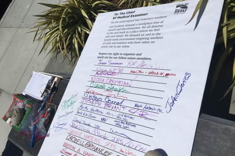 480_seiu1021_med_examiner_protest_petition6-28-18.jpg