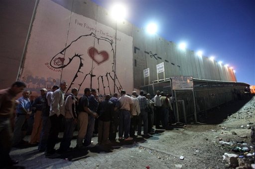 palestinian_workers_line_up_for_work.jpeg 