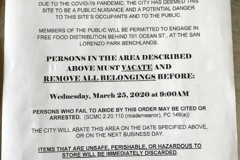 480_notice-to-vacate-santa-cruz-town-clock-homeless-ban-feeding-police-food-not-bombs.jpg