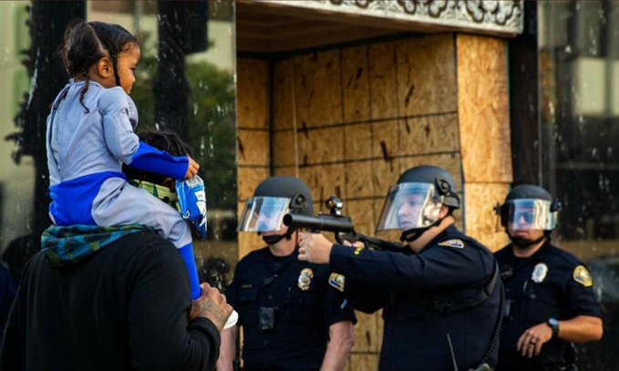 police-gun-at-carried-child.jpg 