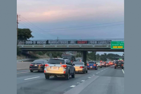 480_20-howard-lichtman-nick-clifford-anti-vaccination-banner-protest-santa-cruz-branciforte-overpass-highway-1.jpg