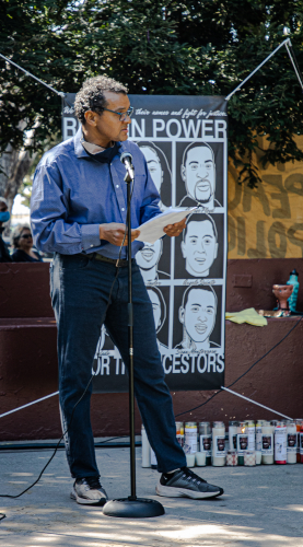 sm_16._city_councilman_fred_simon_reads_an_official_proclamation_honoring_stven_taylor.jpg 