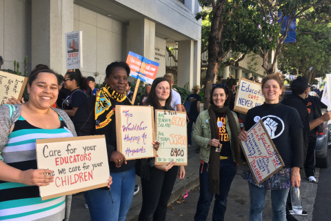 480_uesf_teeachers_with_signs5-9-17_1.jpg