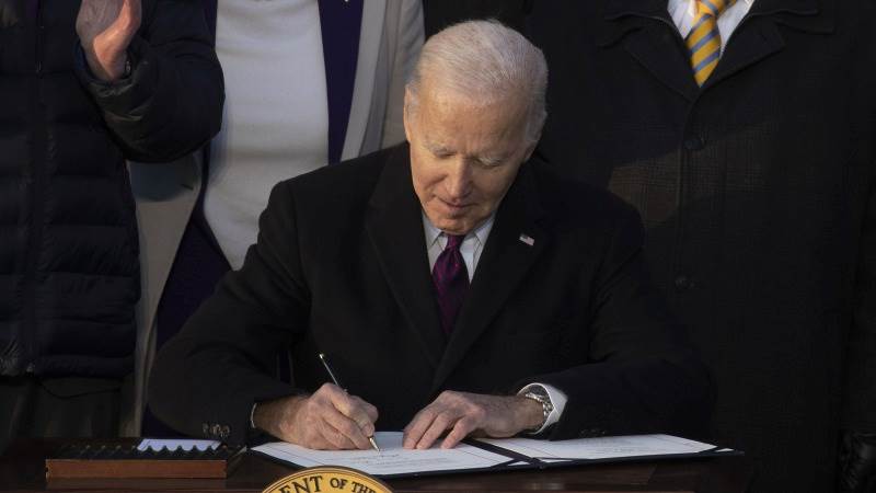 biden-signs-2023-def.jpeg
