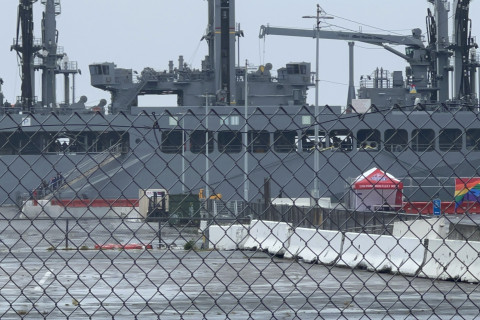 Greenwashing With Gay Flag In Front Of USNS Harvey Milk