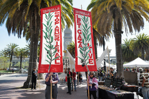 Human rights activists assembled at San Francisco’s Harry Bridge’s Plaza this morning before marching through the Financial District to t...