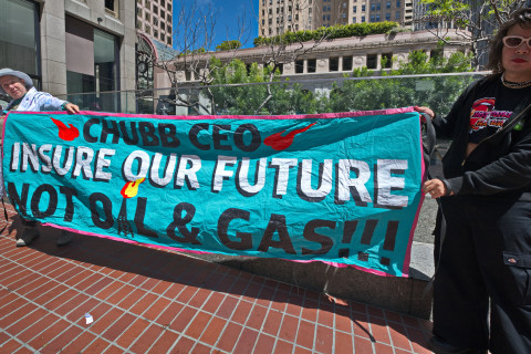 How insurance companies profit by worsening the climate crisis.