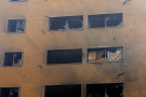 Building with blown out windows. Israeli strikes have displaced over a million people in Lebanon. (photo by Marwan Bou Haidar)
