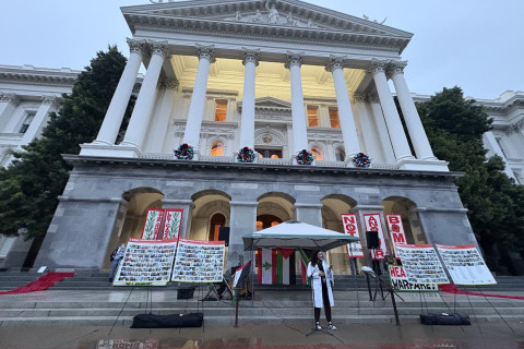 The State Capitol was the backdrop for the visual display. Photo by Dan Bacher.