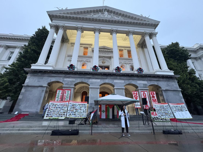 The State Capitol was the backdrop for the visual display. Photo by Dan Bacher.