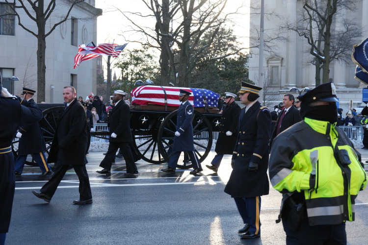 President Carter's funeral procession today was observed by thousands standing in freezing temperatures in honor of the 39th president.