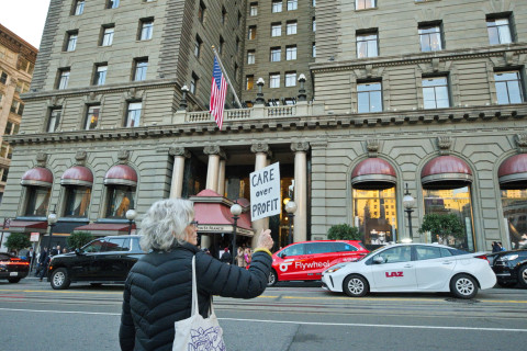 Activists deliver message that "healthcare is for people, not for profits." 