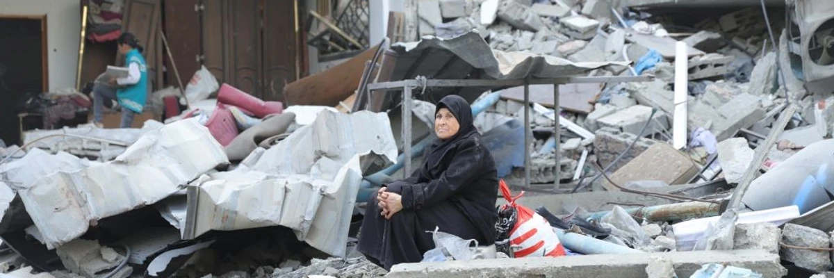 Palestinians continue to return to Beit Lahia, a city in northern Gaza that was devastated by Israeli attacks, through the rubble and damage