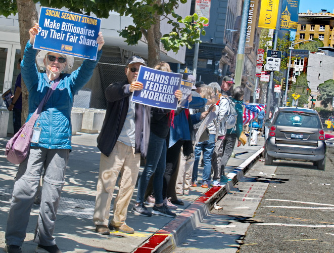 Long term workers and supporters protest mass firings and gutting of the Social Administration
