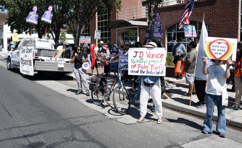 On August 22, demonstrators descended on Palantir's Palo Alto office after a march through the city's downtown. 