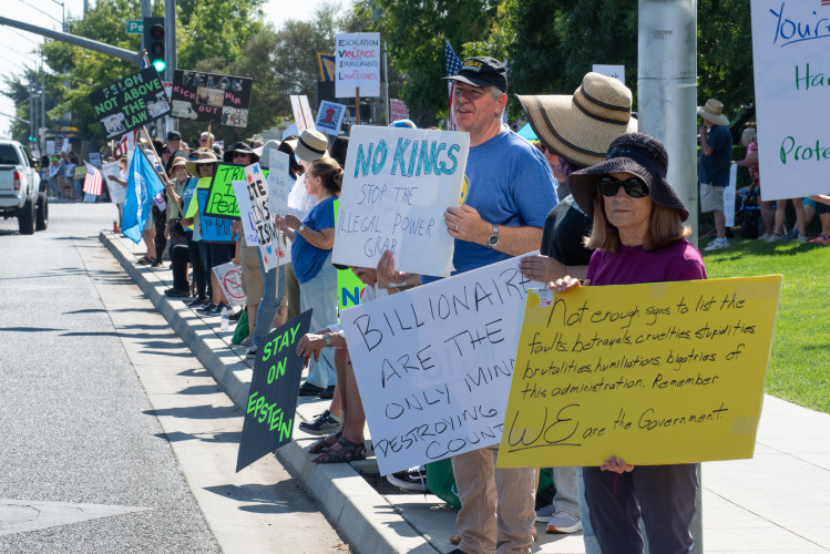Around 250 protesters lined up on the sidewalks at Peach Avenue and Cesar Chavez Boulevard in Fresno on September 1