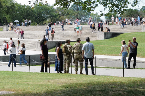 Posing for tourists.