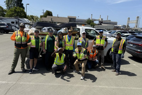 Gallo, his staff, Prologis, and other bootlicker volunteers pose w/ toxic site in background.