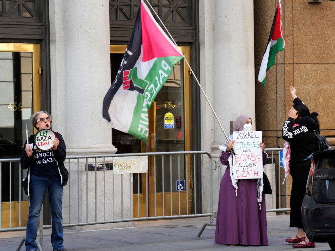 Activists protest the Gaza genocide outside the Israeli Consulate in San Francisco even though a tentative peace deal has been reached be...