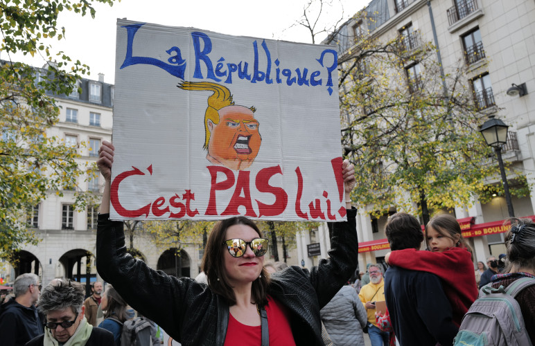 American Expat's along and their French supporters protested during a "No Kings Day" protest rally in Paris.