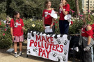 Students display their Make Polluters Pay banner