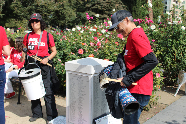 Third Act Sacramento members Goli Sahba and Brian drumming