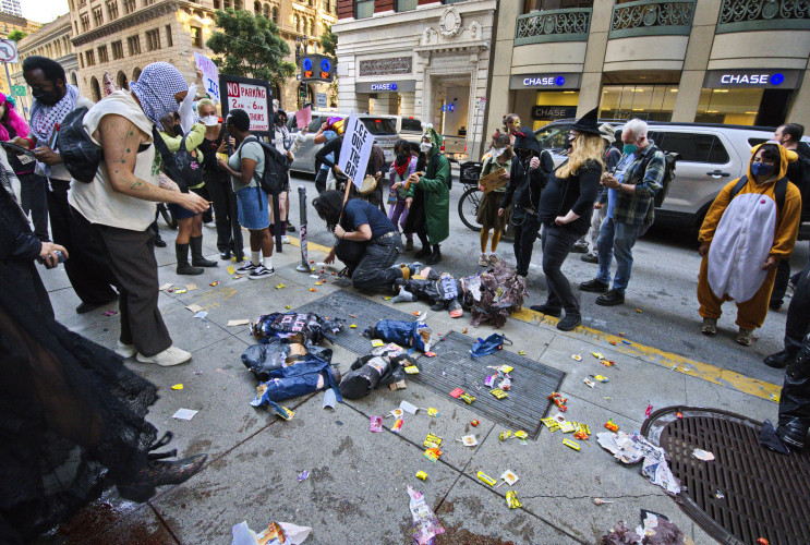 Halloween march and rally at ICE court counters tyranny with costumes and joyous protest, but a with very serious message
