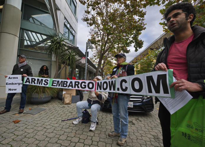 Rally held before packing Port Commission meeting room.  Overflow room filled