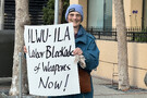Supporter Of Stopping The Genocide With Sign At ILWU HQ