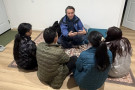 Supervisor Gioia meeting with a Tibetan family who were victims of the fire