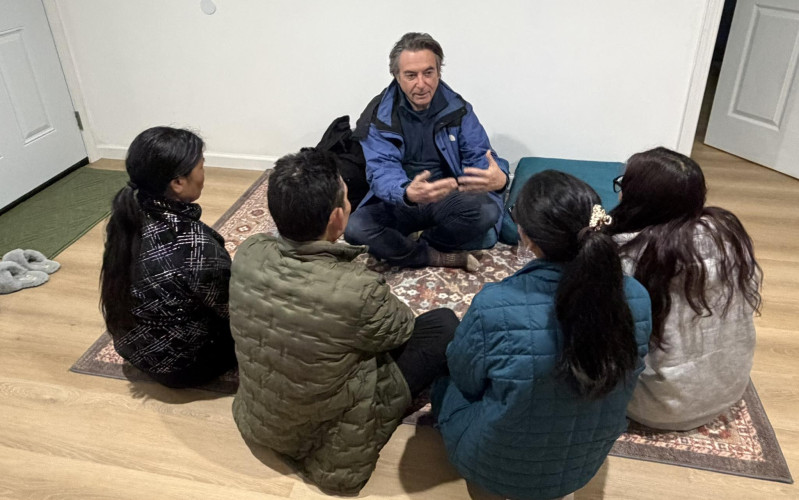Supervisor Gioia meeting with a Tibetan family who were victims of the fire