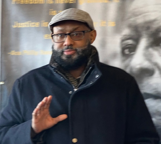 During MLK Day in Seattle Seattle Ride Share Ass. Ed Amed Mumin Spoke out against the terrorism by ICE of the Somali American community.