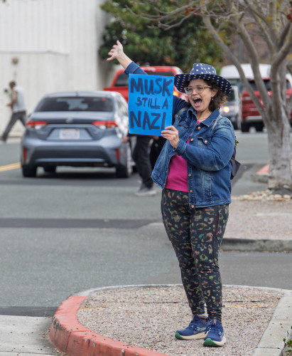 Celebrating an entire year of protesting at Tesla locations in Palo Alto.