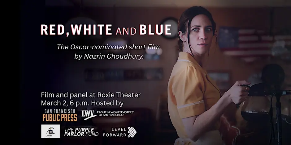 A woman in a diner server uniform carries a coffee carafe.