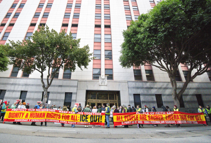 Banners, speeches and music as Justice for Guillermo campaign rallies at 639 Sansome St. (ICE)