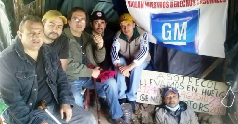 sm_colombian_gm_workers_at_encampment.jpeg