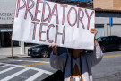The Wolves, Mijente, and the Raging Grannies co-hosted a protest in solidarity with a demonstration at the site of Palantir's new headqua...