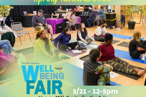 Group of people on Yoga mats with the Well-being Fair graphic