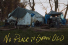 A shelter that has been pieced together from tarps and other materials. Overlaid is the text "No Place to Grow Old."