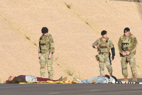 Protesters lying down in roadway