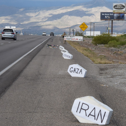 Coffins along the highway mark drone assassinations in different countries