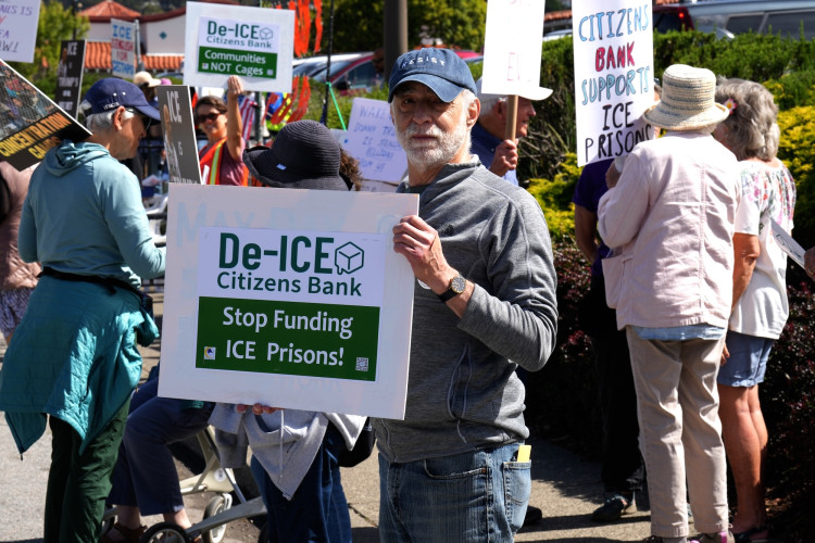 Human rights and immigration reform activists in Marin County protested at the Citizens Private Bank office calling for the bank to sever...