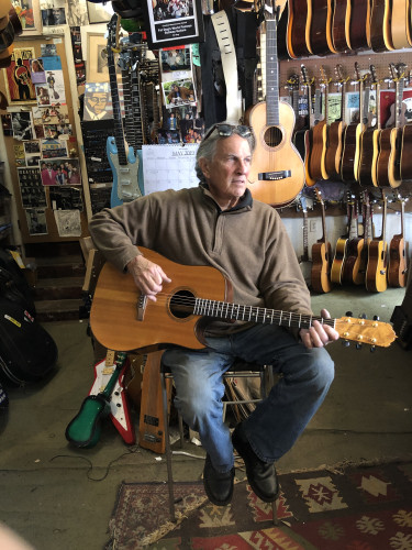 Fatdog, a.k.a. Fatty, owner of Subway Guitars, playing a handmade guitar of mine that I built.