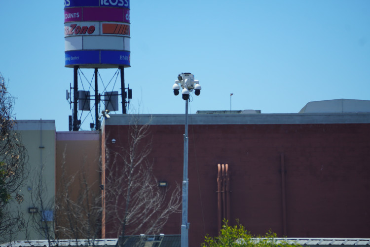 Tower mounted D3 unit with Fruitvale Station shopping ctr. partly in background