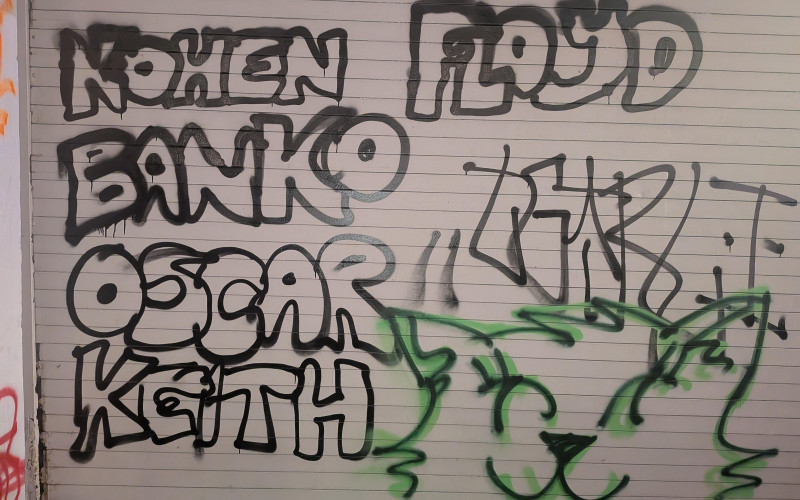 The Stud Alley Photos That The Media Left Out, And What It Tells Us. Graffiti art reading "Kohen Floyd Banko Oscar Keith", plus animal face