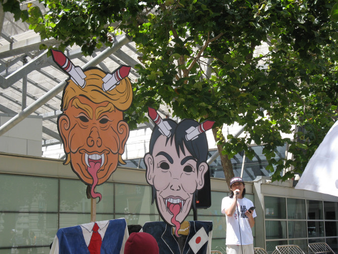 Dance, gongs, drums and
effigies of trump&Takaichi were stomped at the SF federal building Saturday Aug 15 2026.