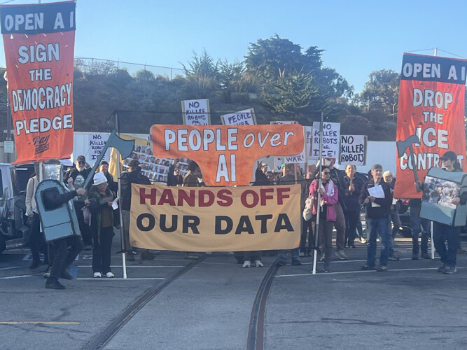 Protesters rallied at the Open AI developers conference to demand an end of the use of AI 