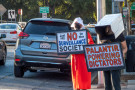 Protesting Palantir’s calls for global domination and the technology they build to do it. 
