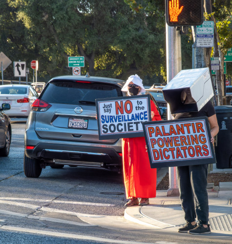 Protesting Palantir’s calls for global domination and the technology they build to do it. 

